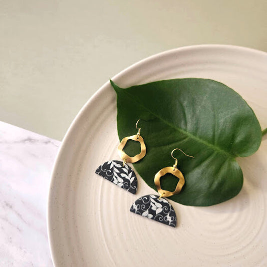 The Isha Black and Gold Screen Printed Polymer Clay Dangle Earrings