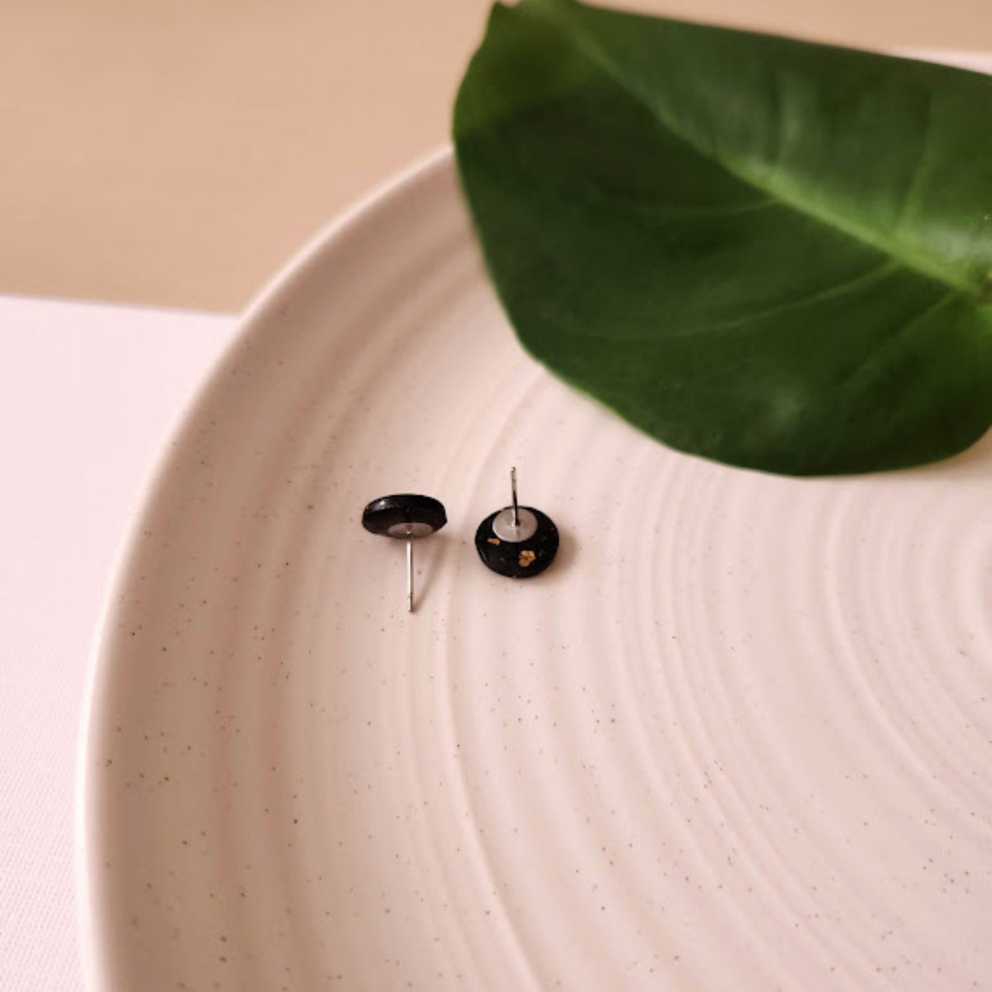 The Renee Black and Gold Round Polymer Clay Stud Earrings