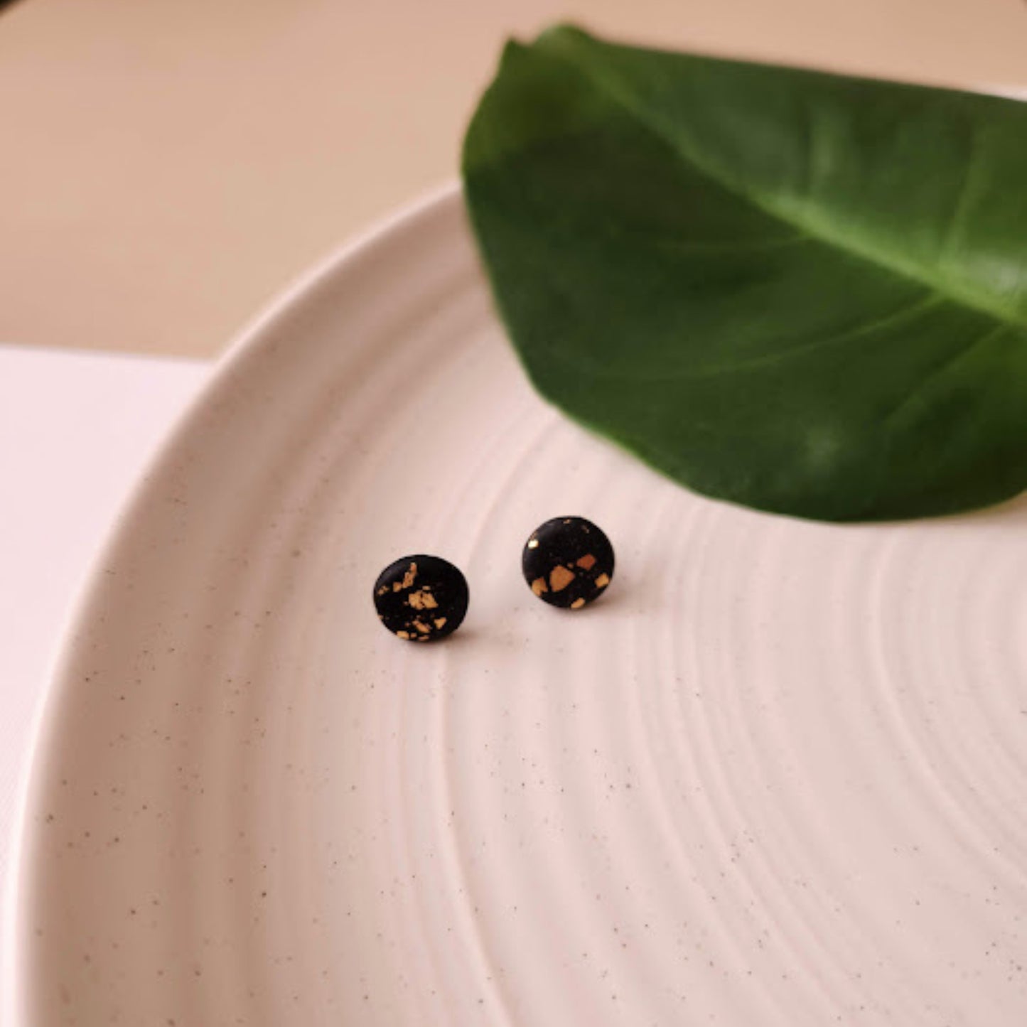 The Renee Black and Gold Round Polymer Clay Stud Earrings